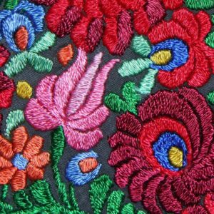 Colorful embroidered floral pattern on fabric